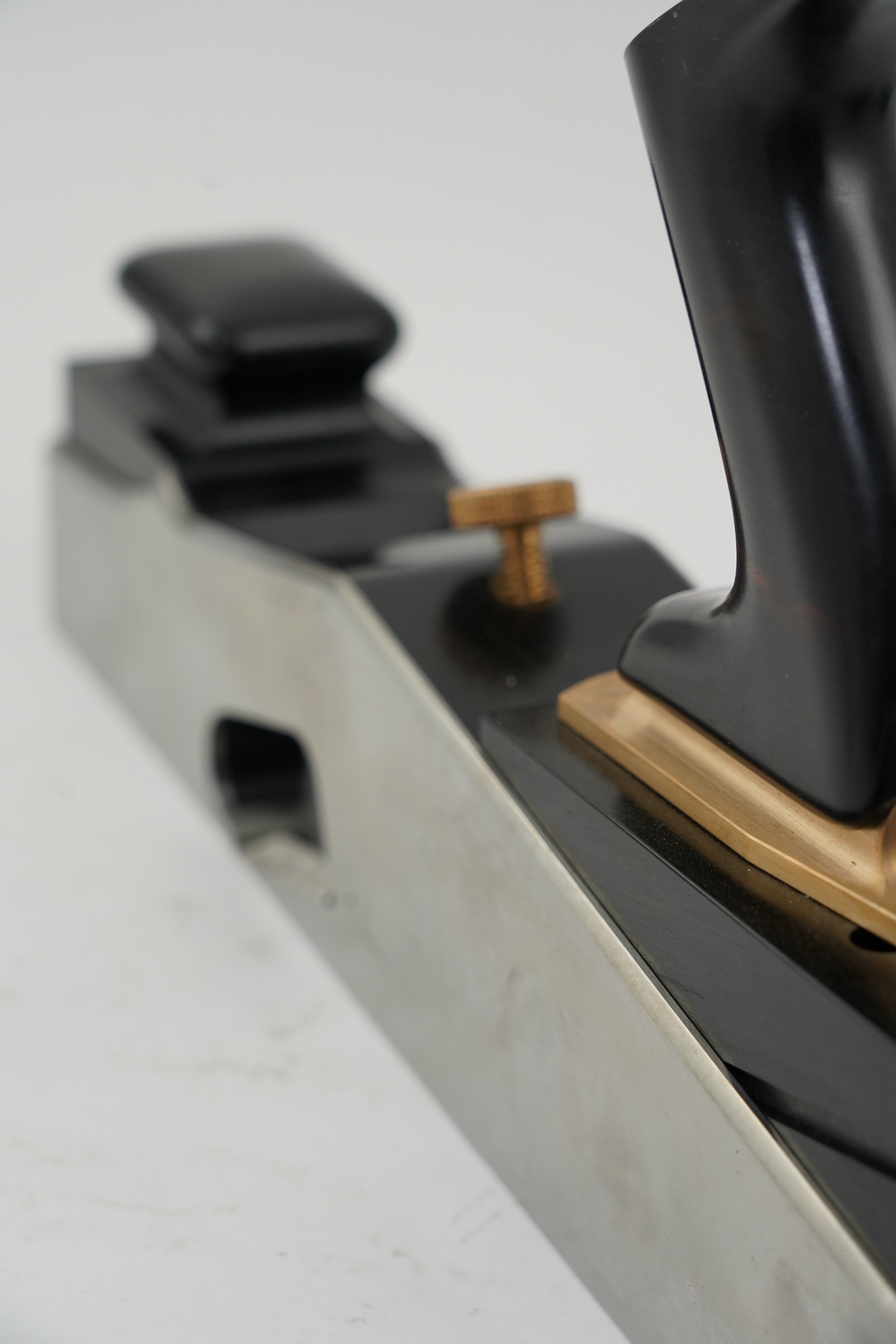 A very fine modern rebate mitre plane by Sauer & Steiner Toolworks, Ontario, handmade in the style of a Norris rebate mitre plane, with ebony infill, handle and wedge, adjustable iron, the handle on an adjustable lateral